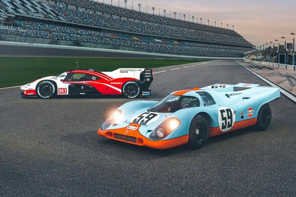 Gulf Oil liveried Porsche 917 (foreground) and Porsche 963 (background) photographed on pitlane at Daytona Speedway
