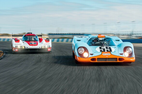 Gulf Oil liveried Porsche 917 (foreground) and Porsche 963 (background) photographed at Daytona Speedway