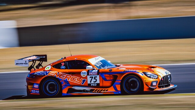 The bright orange and blue coloured #75 Sun Energy 1 Mercedes AMG GT3 at speed during the 2023 Bathurst 12 Hour