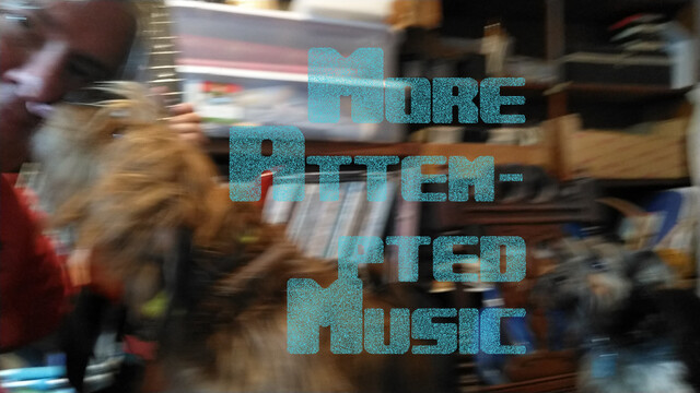 A blurry photo of a guy (me) holding a guitar, leaning into the frame from the left, wiht a couple of motion-blurred dogs climbing over me, with the words, "More Attem-pted Music" in front.