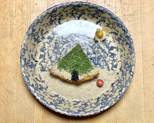 Toriniku Matsukaze-yaki. Tsuji, p.368. 

In a marble blue and tan pie dish is a cut triangle loaf that has an outline of a pine tree. The top is green and has a black sesame trunk. ￼

The last half of the name means “wind in the pines.” The recipe doesn’t call for making the loaf to be green or tree-like but the cognitive dissonance between the name and realization was too much to bear. It just needed to be a tree. 

Baobab is a little peppery fresh but dried is more tea-like and herbal. 

Dried greens (baobab, Awin, huazontle buds, moringa) were roughly ground in a coffee grinder. Fresh huazontle buds and leaves just stripped off the stalk. 

The combination of greens smelled herbal and sweetly floral. 

It looks really powdery but the chicken releases a bit of juice so it clings. The greens were a faint afterthought, even piled-on you couldn’t taste them that much. 

Jamaican cherry is supposed to be a beach ball in the pic. 
