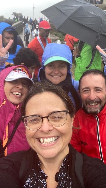 Group selfie of my dear  supporters: Carla, Manolo, Audrey, and my Sherpa Marzia. They wear windbreakers, hats and hoods