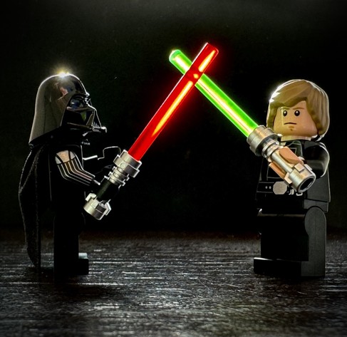 LEGO Darth Vader and Luke in alight saber fight