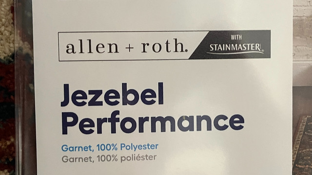 Carpet information card:  JEZEBEL PERFORMANCE. WITH STAINMASTER. Garnet. 100% Polyester