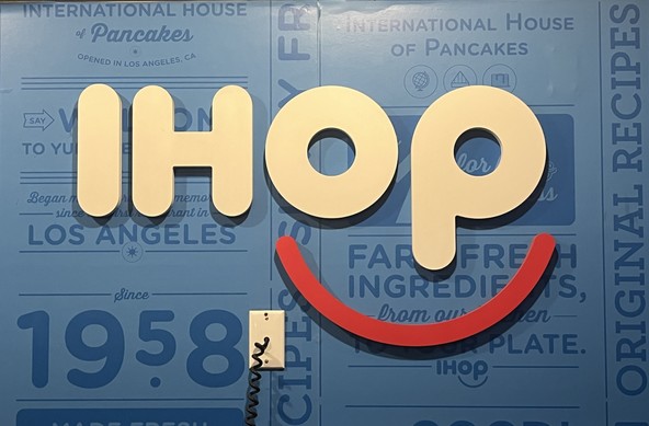 The IHOP logo, whose "p" is a penis on the downstroke. 