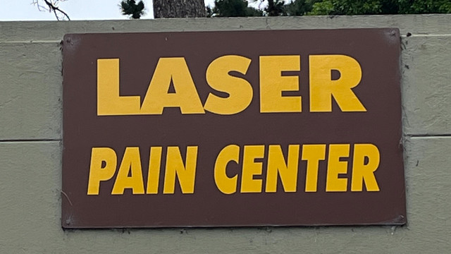 Business sign: 
LASER PAIN CENTER