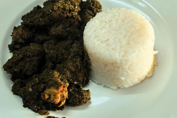 Ravitoto with white rice, a classic meal from Madagascar.