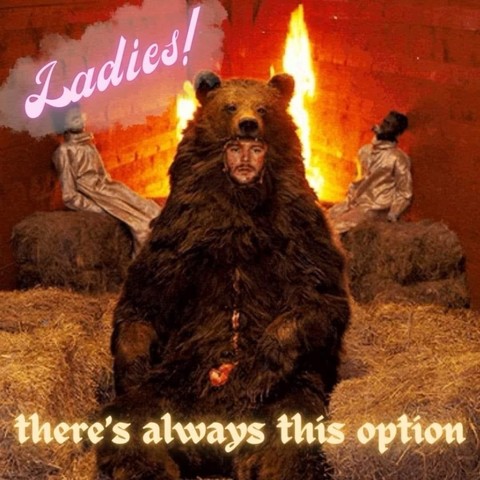 A person dressed as a bear, with text overlay saying 