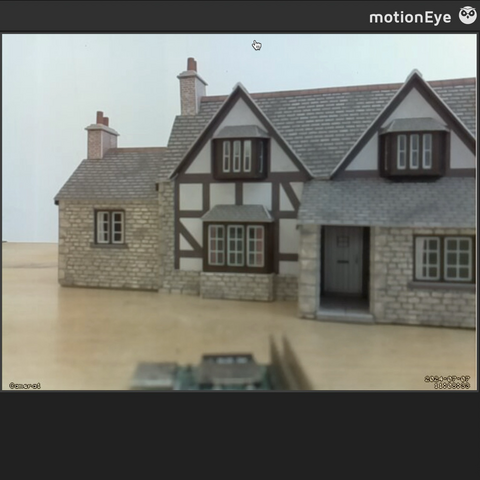 Model cottage as seen by camera