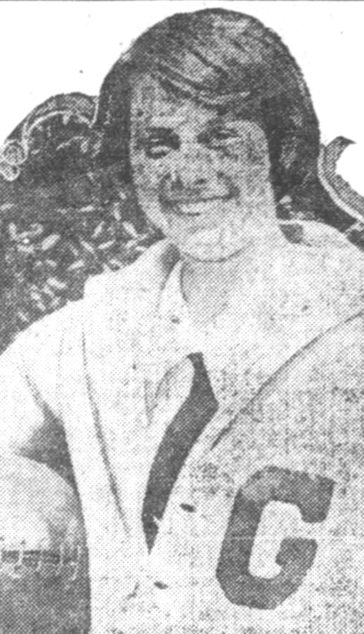 Anna Espenschade, a young smiling white woman, modeling her letter sweather from Goucher College in a 1924 newspaper photo