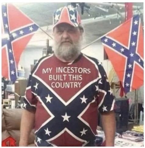 White, bearded, confederate flag hatted, confederate flag-waving idiot with 