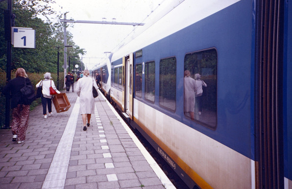 Getting off a train in the outskirts of Amsterdam. Shot on 35mm expired Kodak Ektachrome 100VS analog film with a Lomo Lc-a camera. 