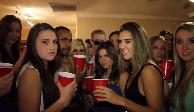 Group of college students at a party starring awkwardly at you