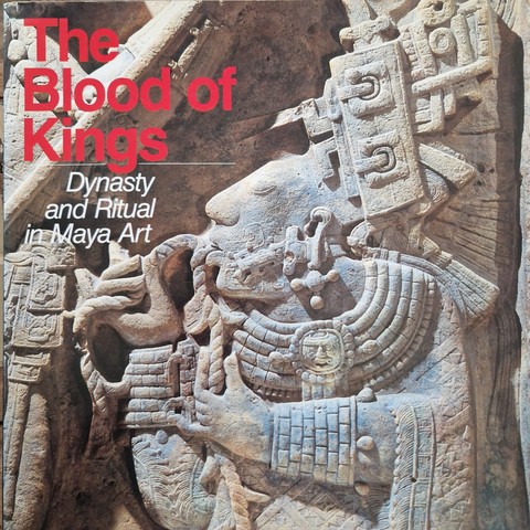 View of the cover of 'The Blood of Kings. Dynasty and Ritual in Maya Art' by Linda Schele and Mary Ellen Miller. It shows a detail from a lintel from Yaxchilan, Mexico with a very richly dressed woman, Lady Xoc, who pulls a rope studded with thorns through her tongue in a bloodletting ritual.