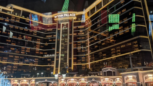 A cable car going through in front of Wynn Palace, one of the most luxurious mall in Macao