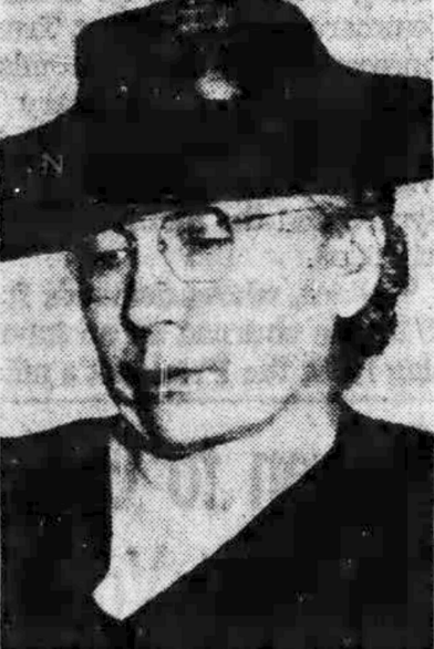 Leta Myers Smart, from a 1946 newspaper; a middle-aged woman with greying hair worn to the nape, wearing a dark brimmed hat and glasses