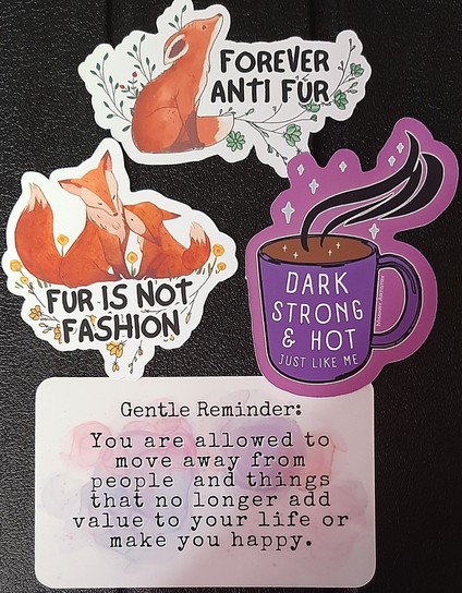 Stickers on a black background including 2 with fox art with anti-fur messages and a text on a watercolour background that says: 
Gentle reminder:
You are allowed to move away from people and things that no longer add value to your life or make you happy.