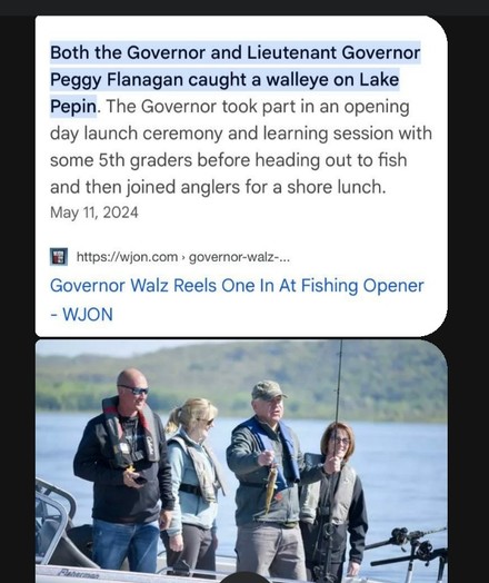 Vice presidential nominee Walz holding a walleye.