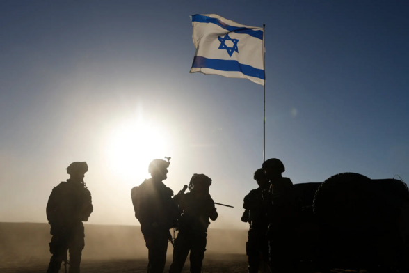 New York Times depiction of soldiers standing beneath an Israeli flag.