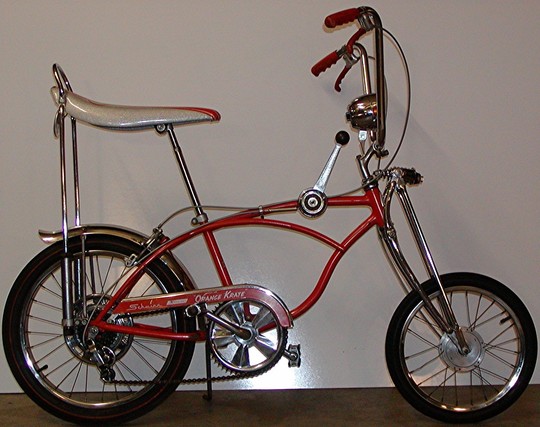 Fast Back bike with a banana seat,  raised handlebars and extended forks.