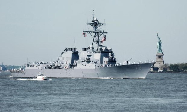 In this handout from the Coast Guard, the USS Oscar Austin moves up the Hudson River for during the Parade of Ships to begin the Fleet Week celebration. (Getty Images)