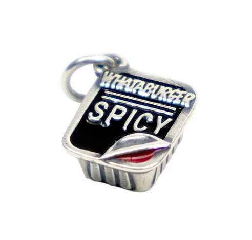 silver dangle jewelry (from James Avery) in the shape of a ketchup packet from a hamburger place: 
 
