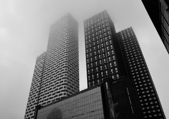 High rise towers in mist