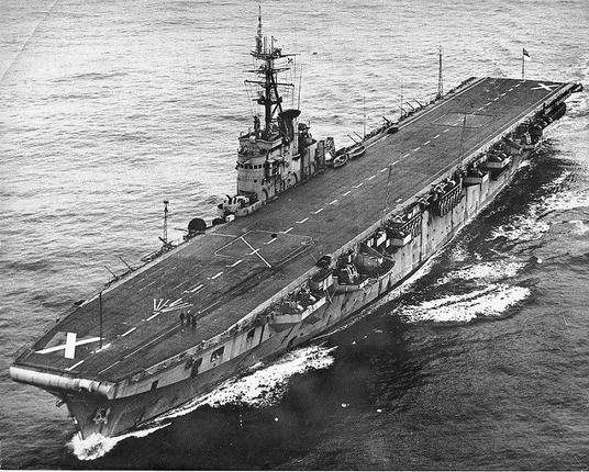 HMCS Magnificent was a Majestic-class aircraft carrier operated by the Royal Canadian Navy from 1948 to 1957.

Towards the end of the Second World War, Canada anticipated the need for additional and larger aircraft carriers to operated in the Pacific against Japan. At this time it crewed two British Royal Navy escort carriers (HMS Nabob which was heavily damaged and HMS Puncher). Negotiations led to Britain offering the Colossus-class carrier, HMS Warrior (HMCS Warrior in Canadian service) and The Majestic-class HMS Magnificent (HMCS Magnificent in Canadian service).

Warrior entered service in 1946, but was considered unsuitable for Canadian conditions, as she had been built to operate in the tropics and lacked heating. In 1948 she was replaced by Magnificent. The carrier was commissioned into the Royal Canadian Navy on 21 March 1948.

Following the Suez Crisis, the Canadian Government agreed to send a peacekeeping for to Egypt. HMCS Magnificent transported 406 Canadian troops and their vehicles along with 4 Royal Canadian Air Force de Havilland Canada DHC-3 Otters and a single H04S helicopter. For this trip, she had her guns removed and complement reduced to 600. She unloaded her cargo in Port Said in January 1957.
