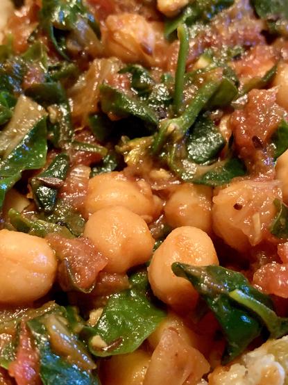 Chickpea curry recipe with sissoo spinach with the leaves still retaining leaf shape after 10’ of cooking. 