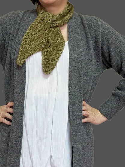 I am wearing my finished knitted scarf over a white tank and gray cardigan.