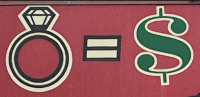 Three symbols on a red background:  a diamond ring, an equals sign, a green dollar sign. From a pawnshop's sign.