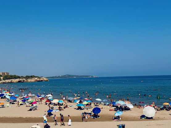 Platja Arrabassada on holiday Aug 15 with lots of beachgoers