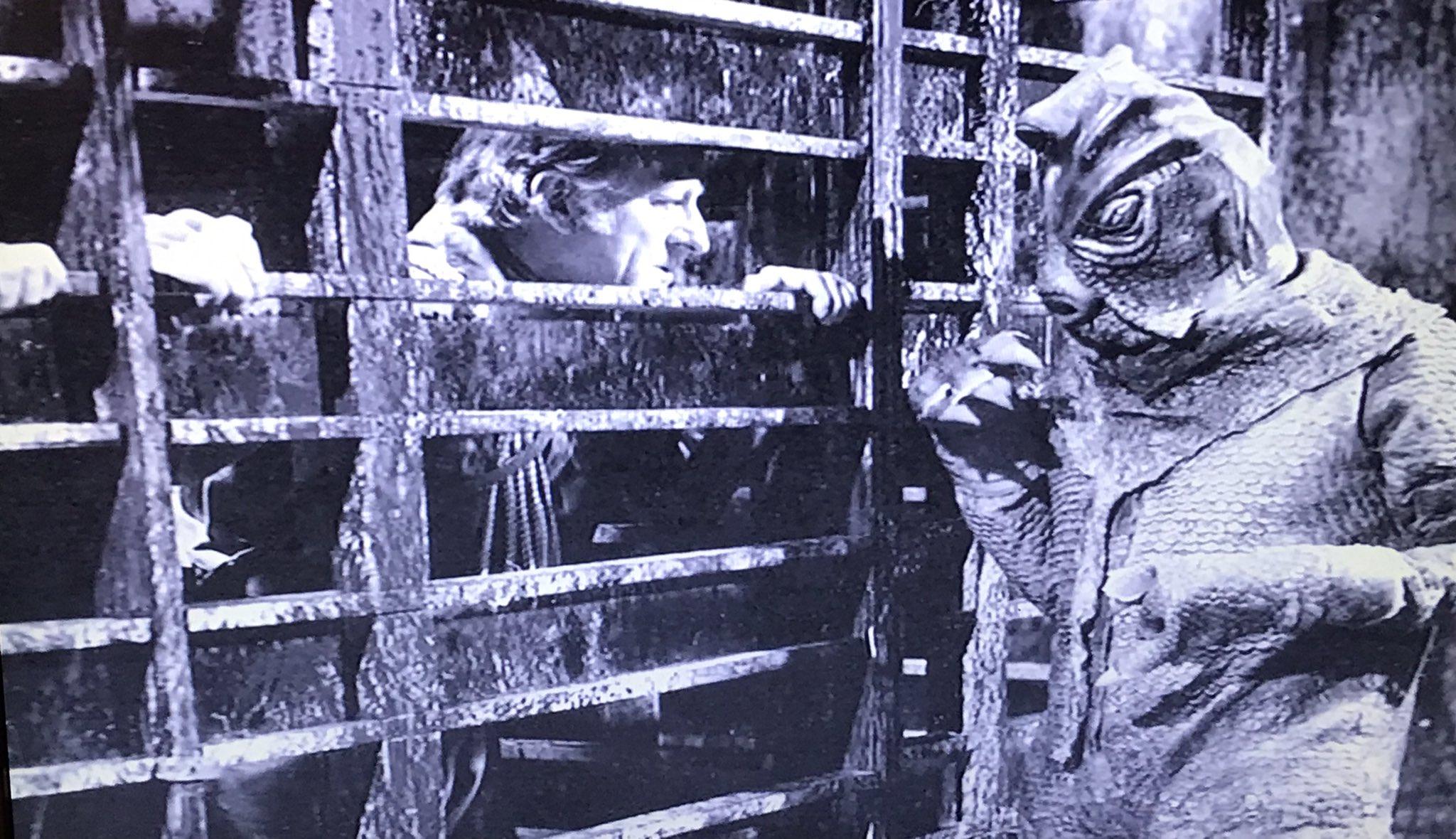 The 3rd Doctor Jon Petwee captured by a Silurian in the Doctor Who story The Silurians