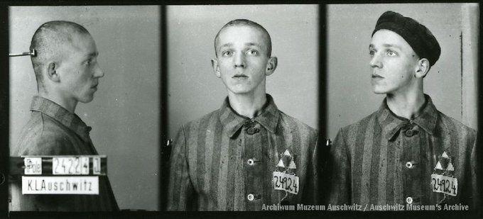 A mugshot registration photograph from Auschwitz. A man with a shaved head wearing a striped uniform photographed in three positions (profile and front with bare head and a photo with a slightly turned head with a hat on). The prisoner number is visible on a marking board on the left.