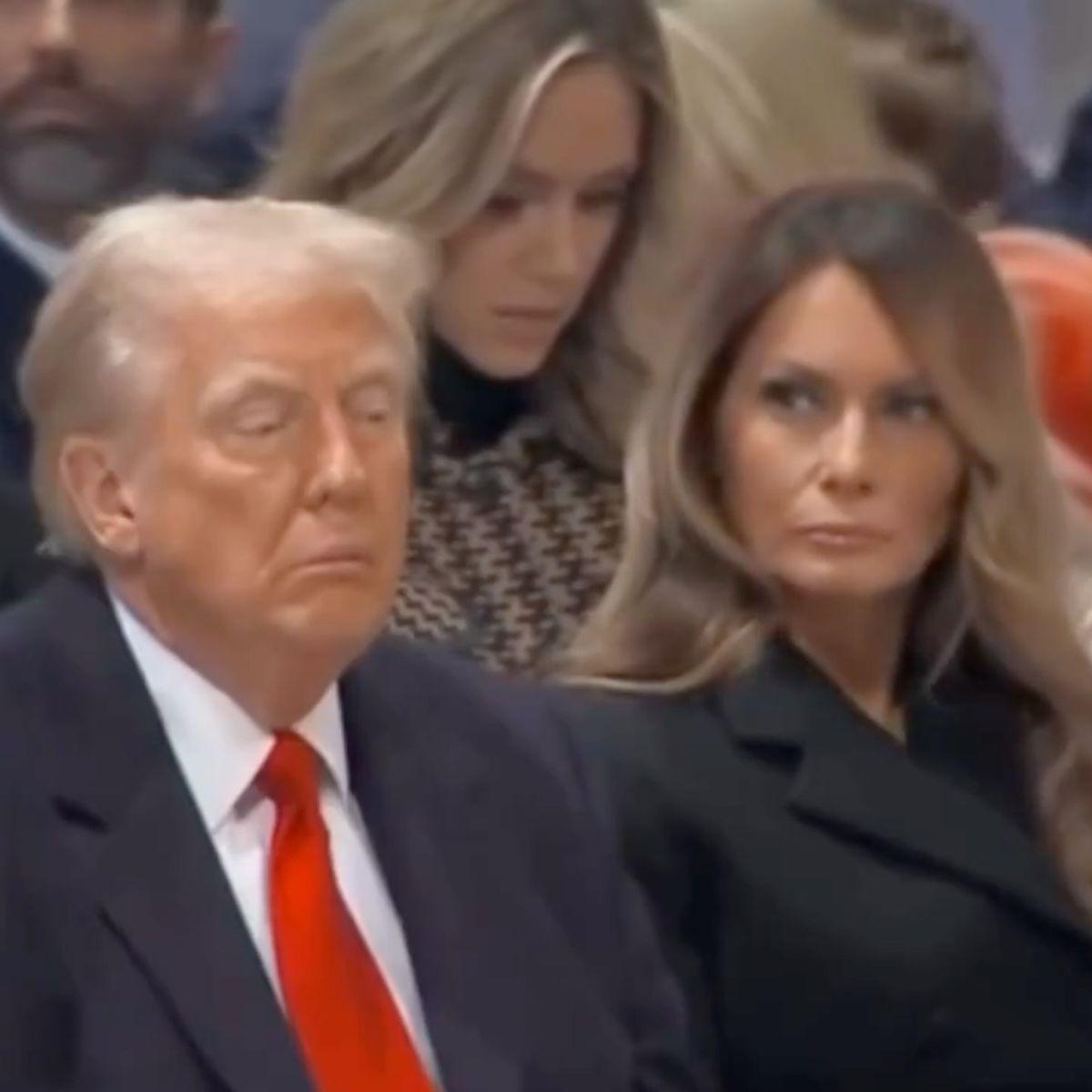 Melania giving an unhappy sidelong glance at Donald Trump while he nods off at a public event.