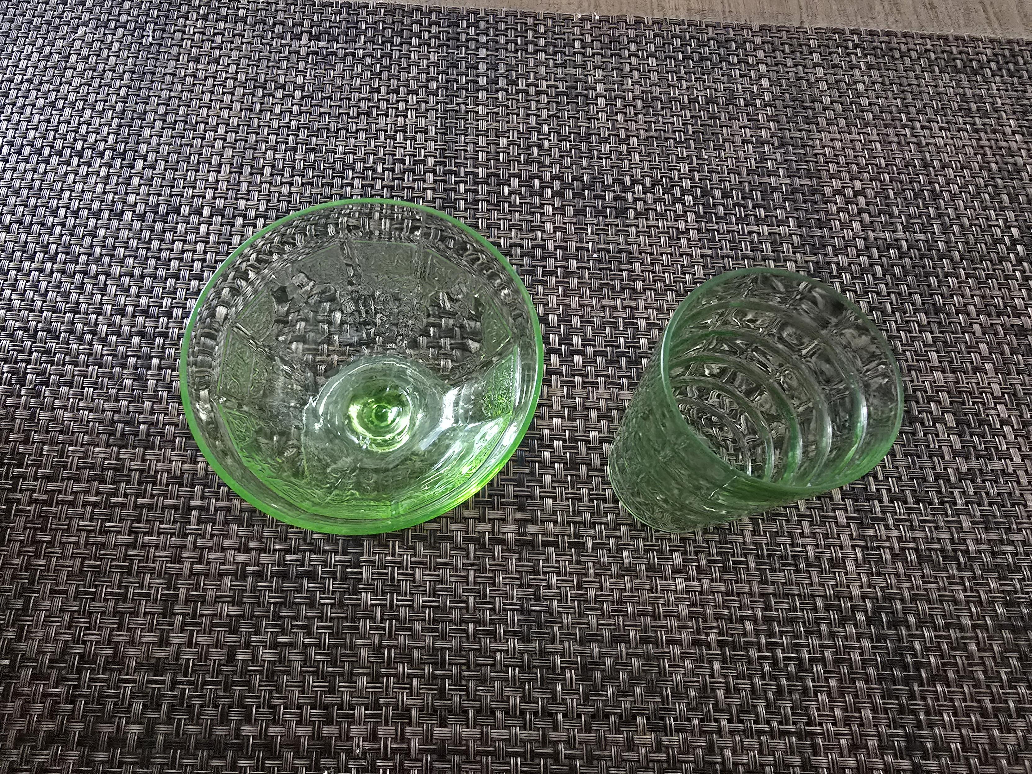 Uranium glass sitting on the bar in regular light, top view.