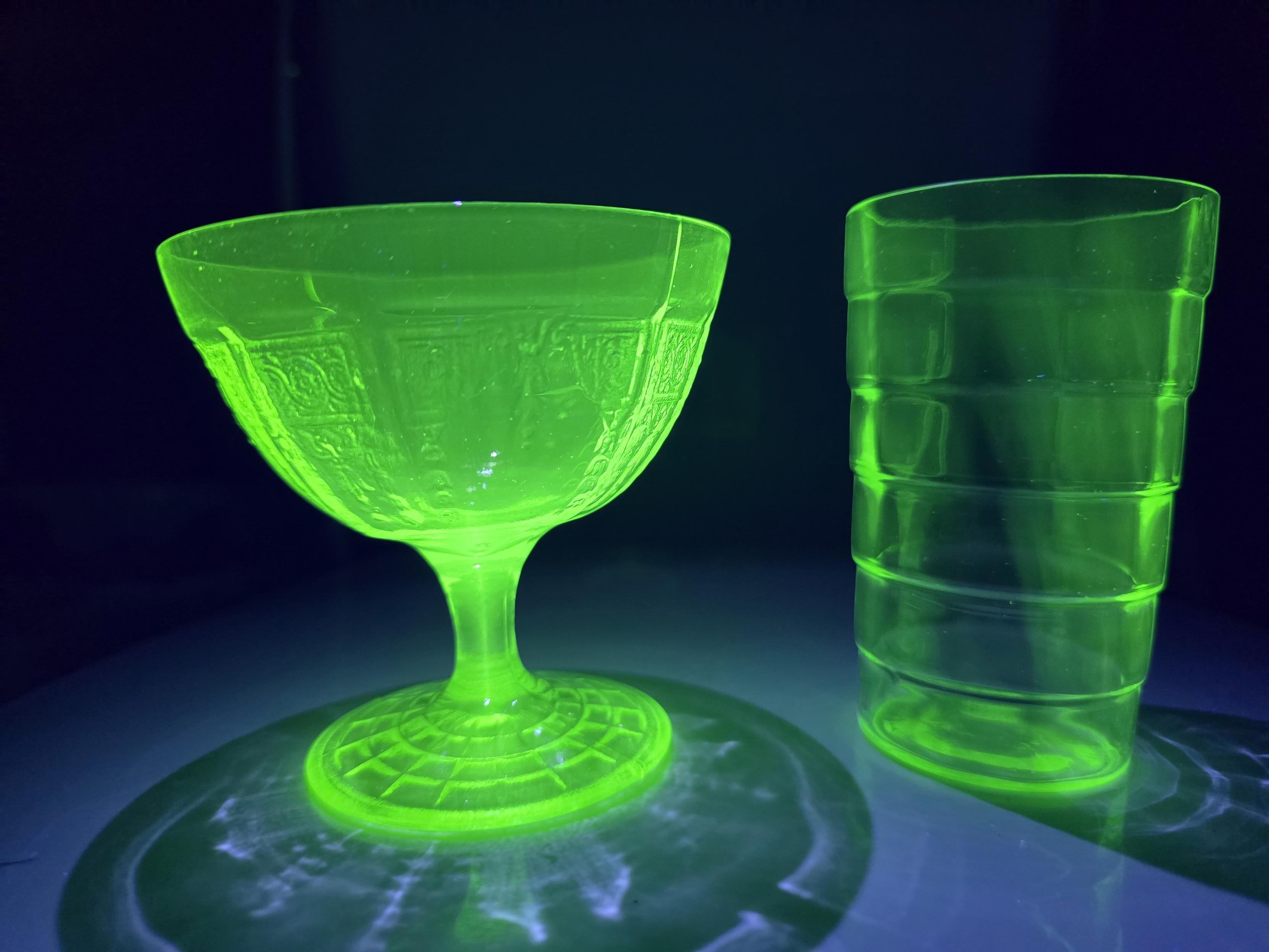Uranium glass in UV light, side view.
