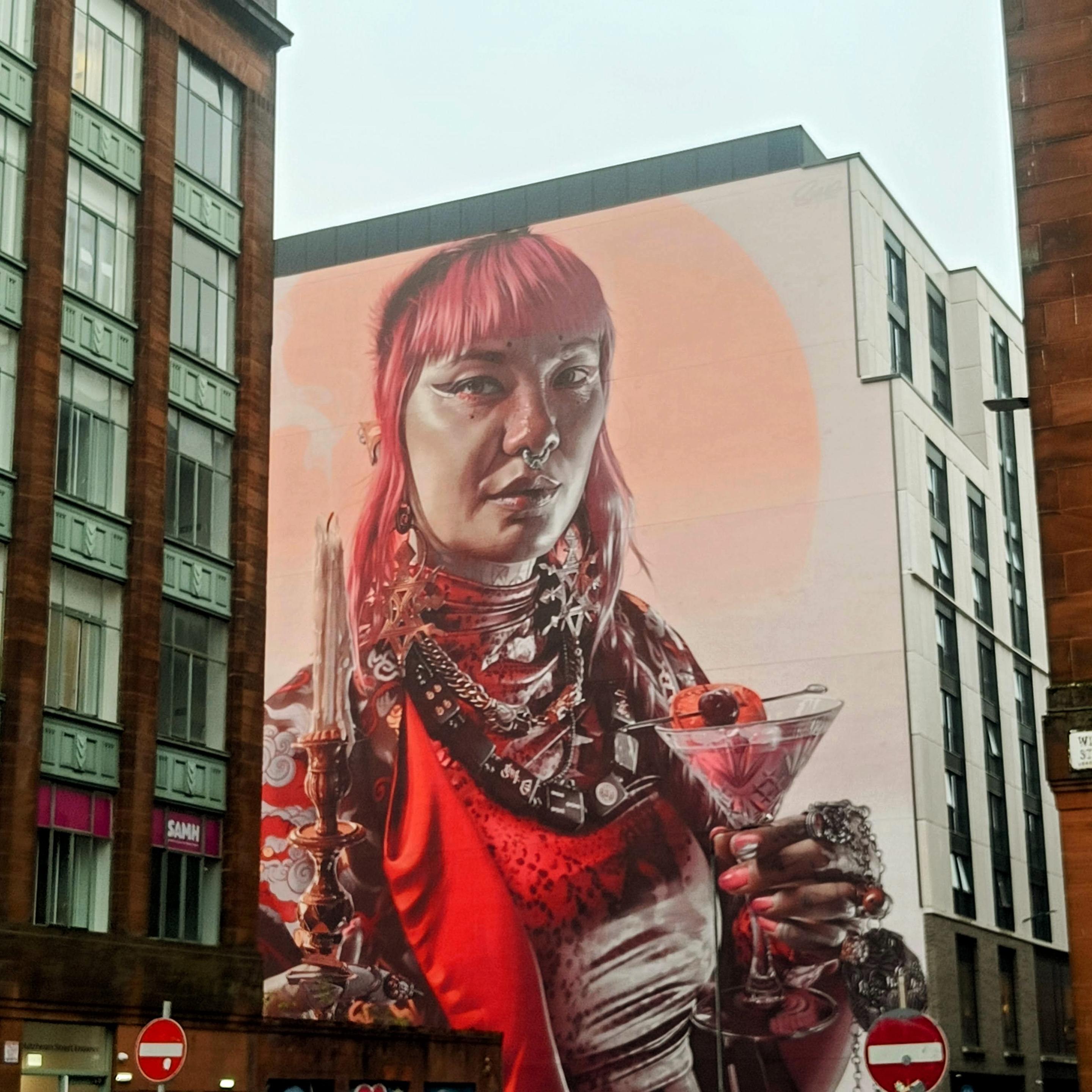 Street Mural of a woman with a cocktail glass