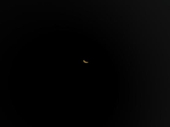 partial eclipse seen through camera obscura. With the eye it was much clearer than I could focus with the phone. 