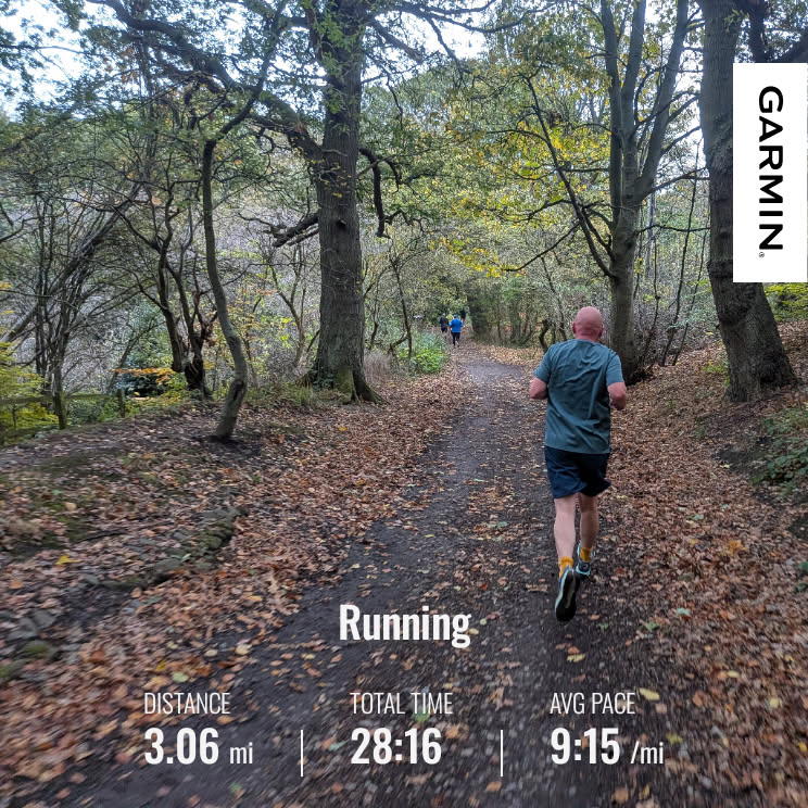 A graphic from a Garmin device showing an (almost) 5k parkrun and a photograph of the blessed downhill section and runners.