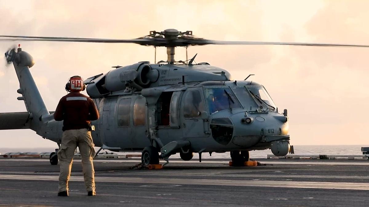 Still frame from an official US military video: USS Theodore Roosevelt Conducts Helicopter Flight Operations.