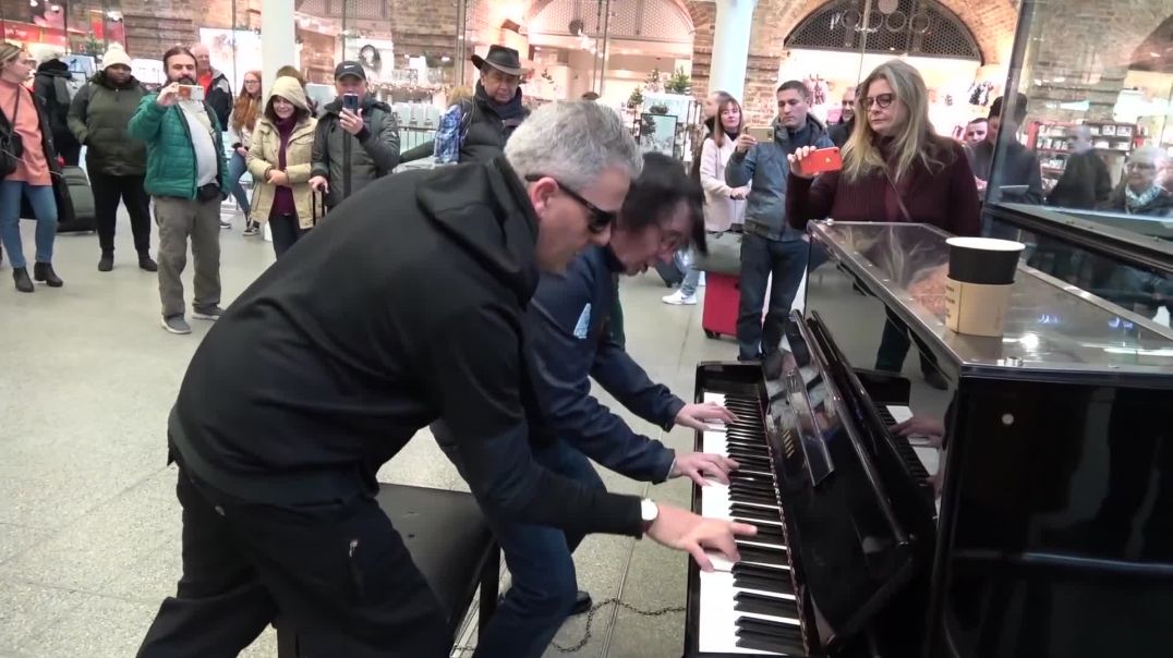 Epic Piano Battle Brings Crowd To A Standstill
