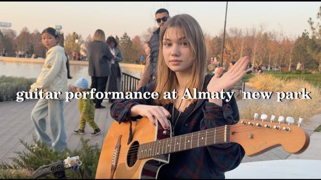 Elizaveta Nikonova - guitar performance in Almaty in a new park