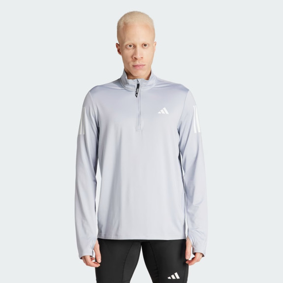 OWN THE RUN HALF-ZIP JACKET