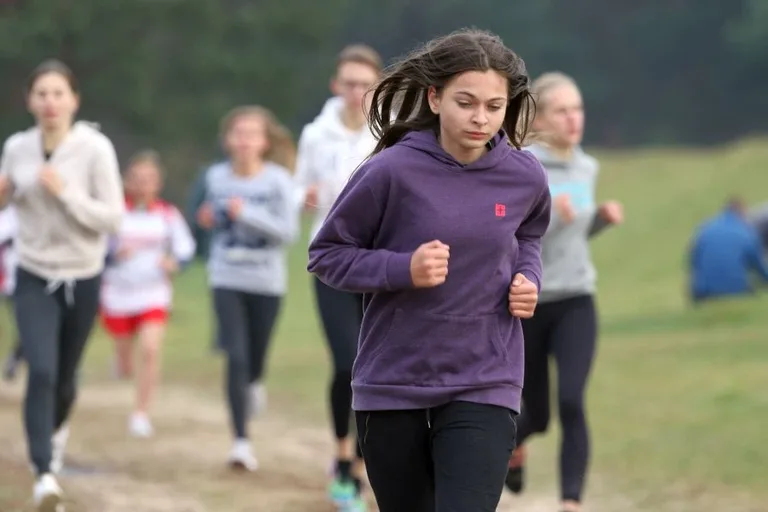 Biegacze z medalami i awansami (zdjęcia, wideo)